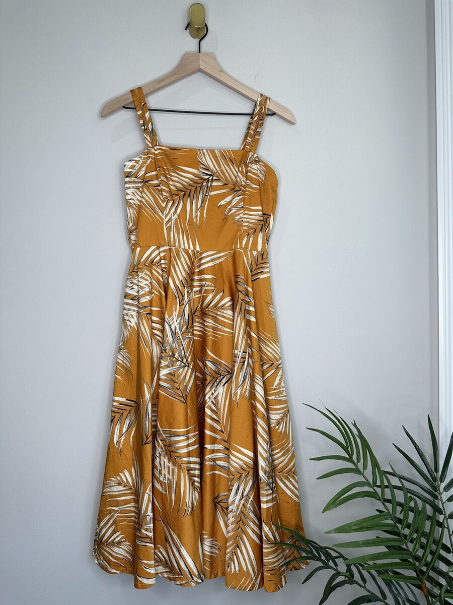 Illustrative example of marigold dress from Google Search