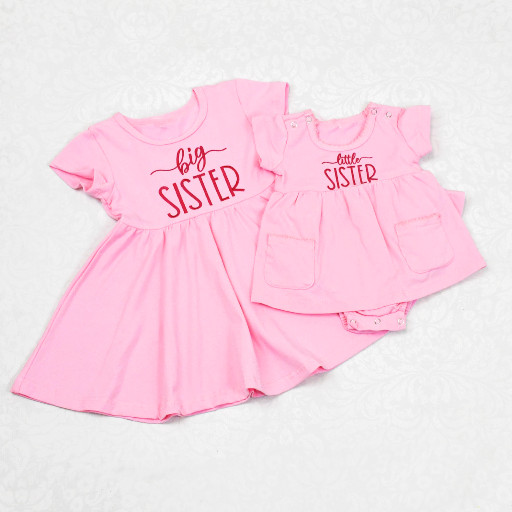 Illustrative example of matching sister dresses from Google Search