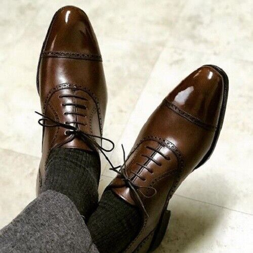 Illustrative example of mens dark brown dress shoes from Google Search