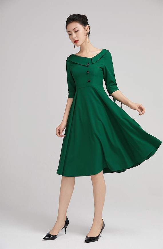 Illustrative example of midi green dress from Google Search
