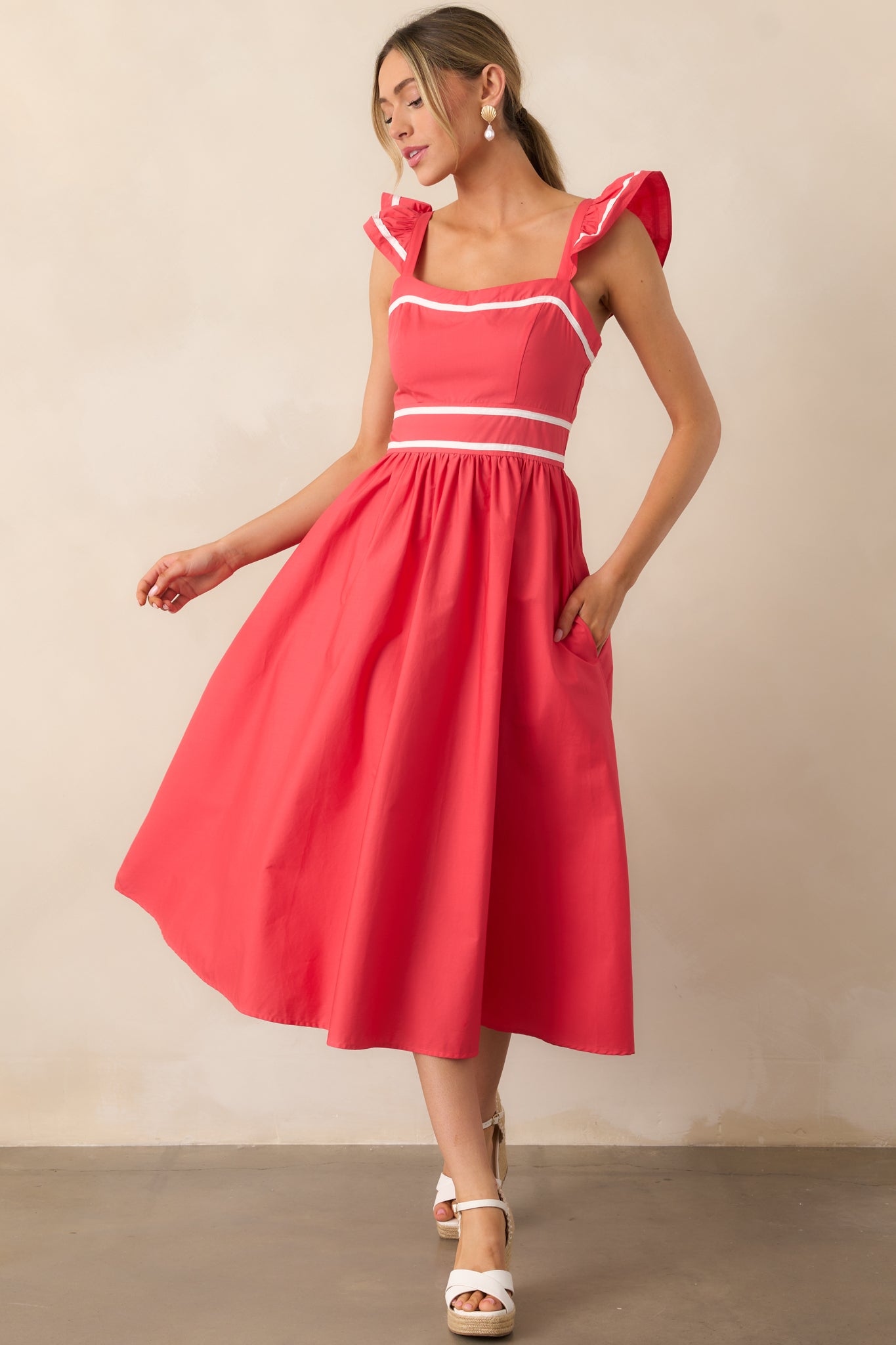 Illustrative example of midi red dress from Google Search
