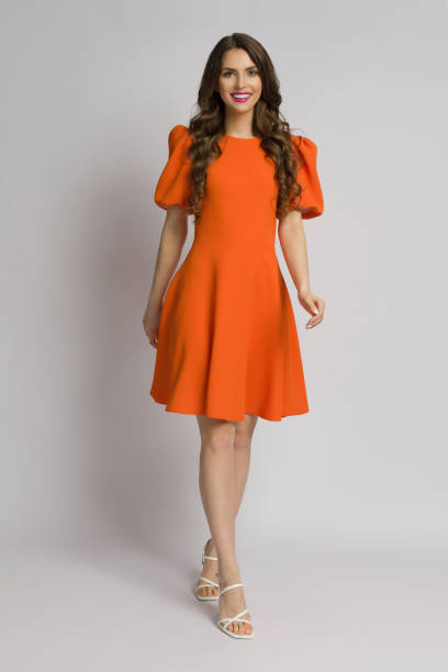 Illustrative example of orange colour dress from Google Search