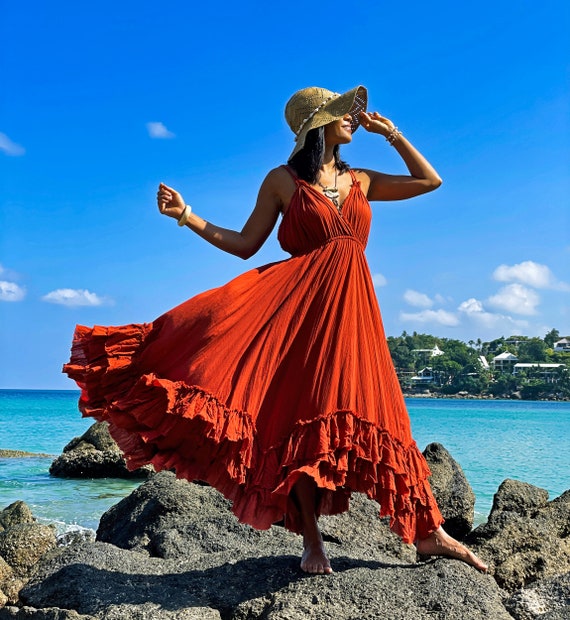 Illustrative example of orange long dress from Google Search