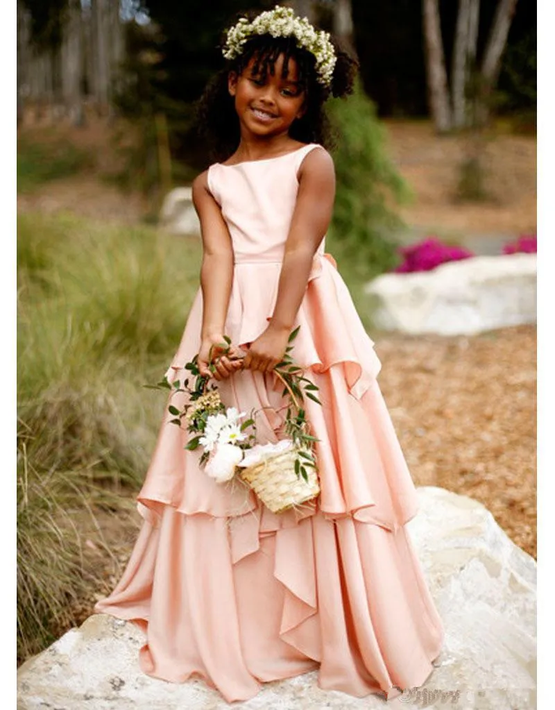 Illustrative example of pink flower girl dresses from Google Search