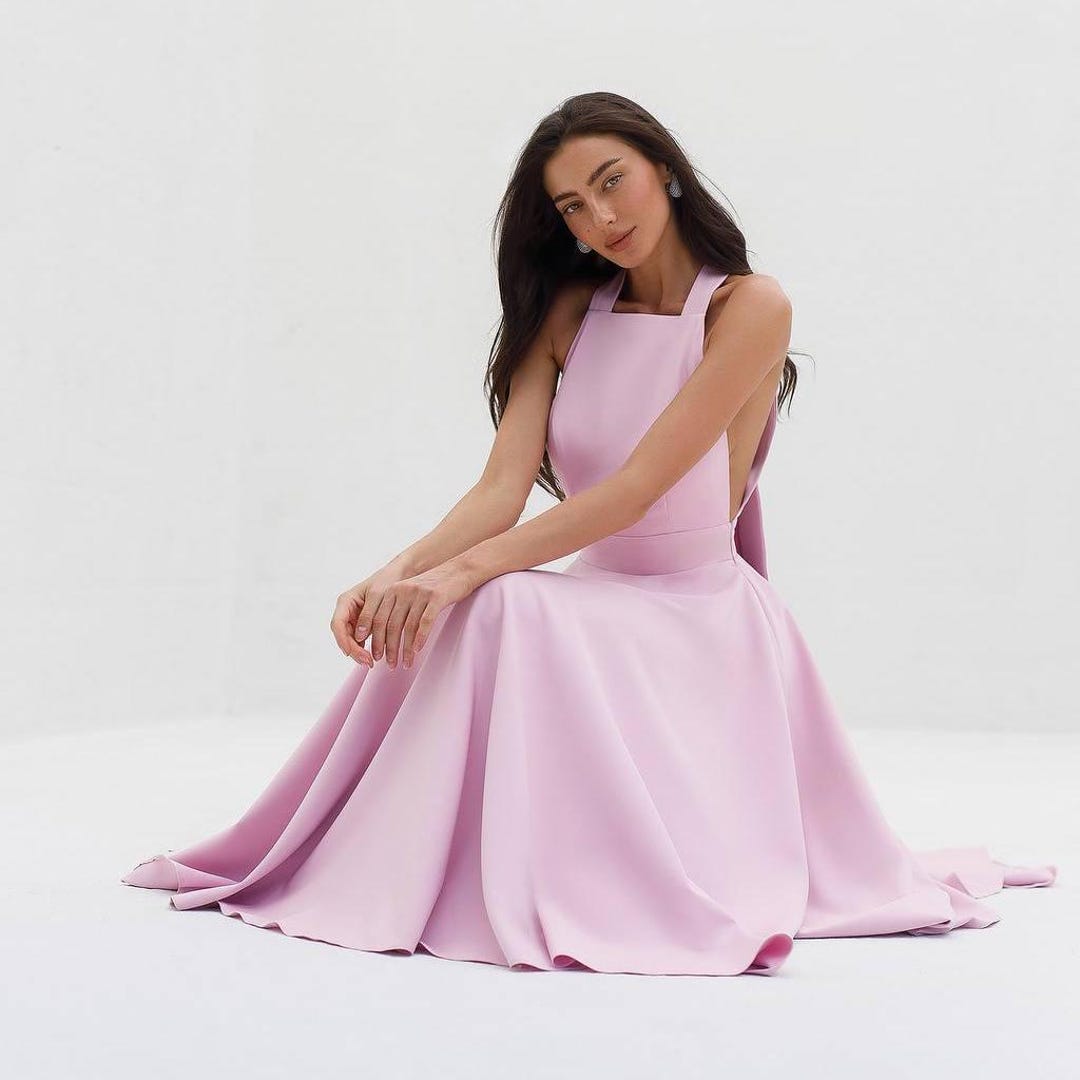 Illustrative example of pink halter dress from Google Search