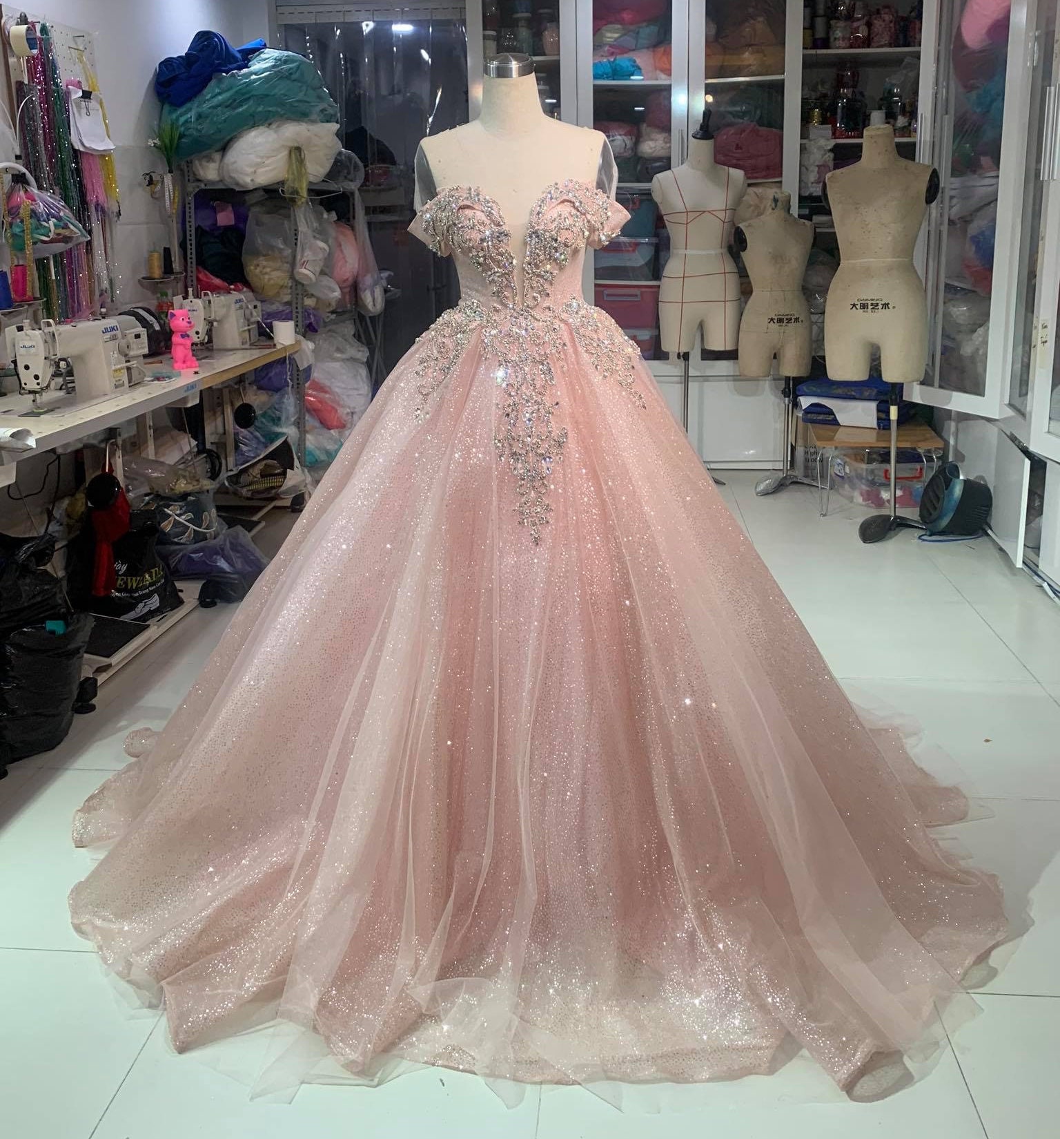 Illustrative example of pink sparkle dress from Google Search