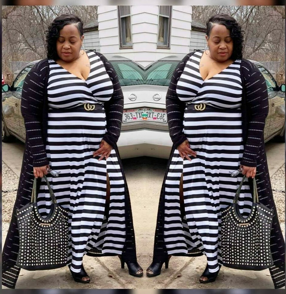 Illustrative example of plus size dress black and white from Google Search