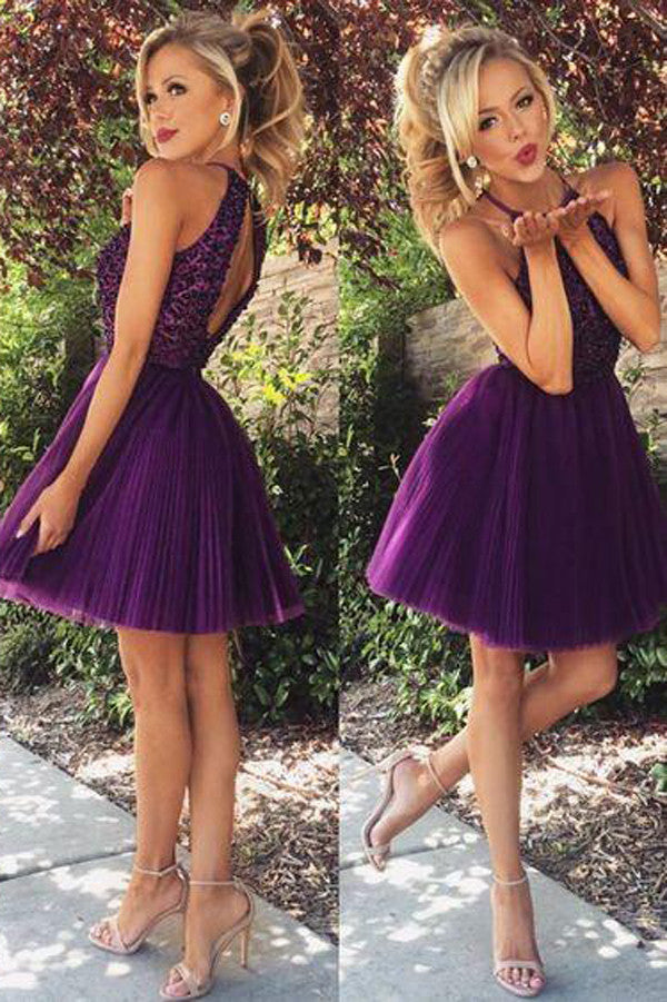 Illustrative example of purple hoco dresses from Google Search