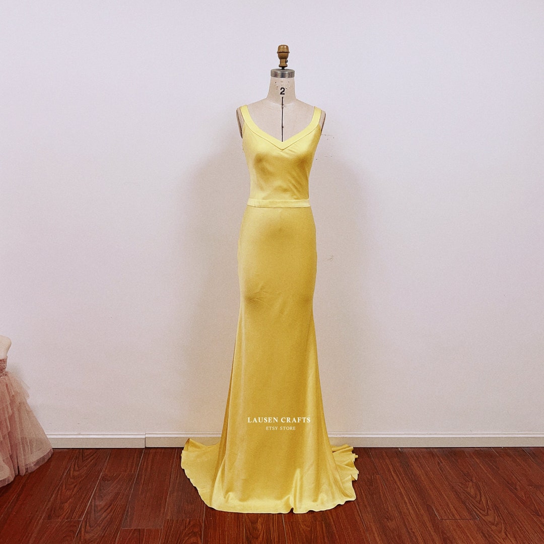 Illustrative example of satin yellow dress from Google Search