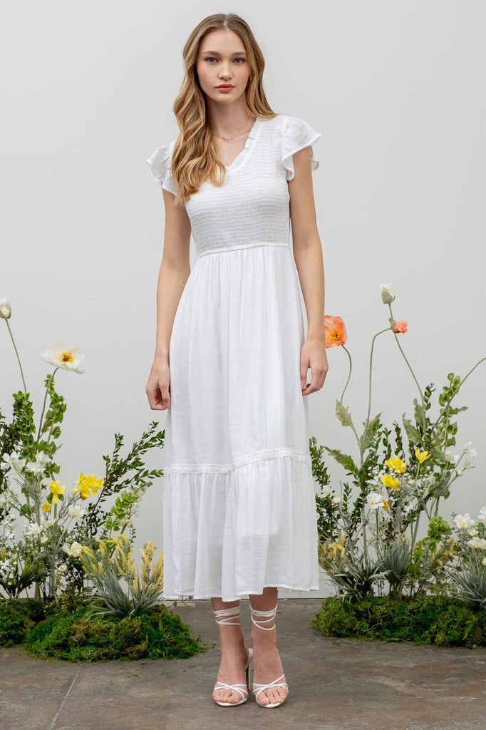 Illustrative example of scoop neckline dress from Google Search